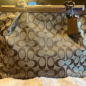 Tan and brown Coach bag serial number C1160-F17725